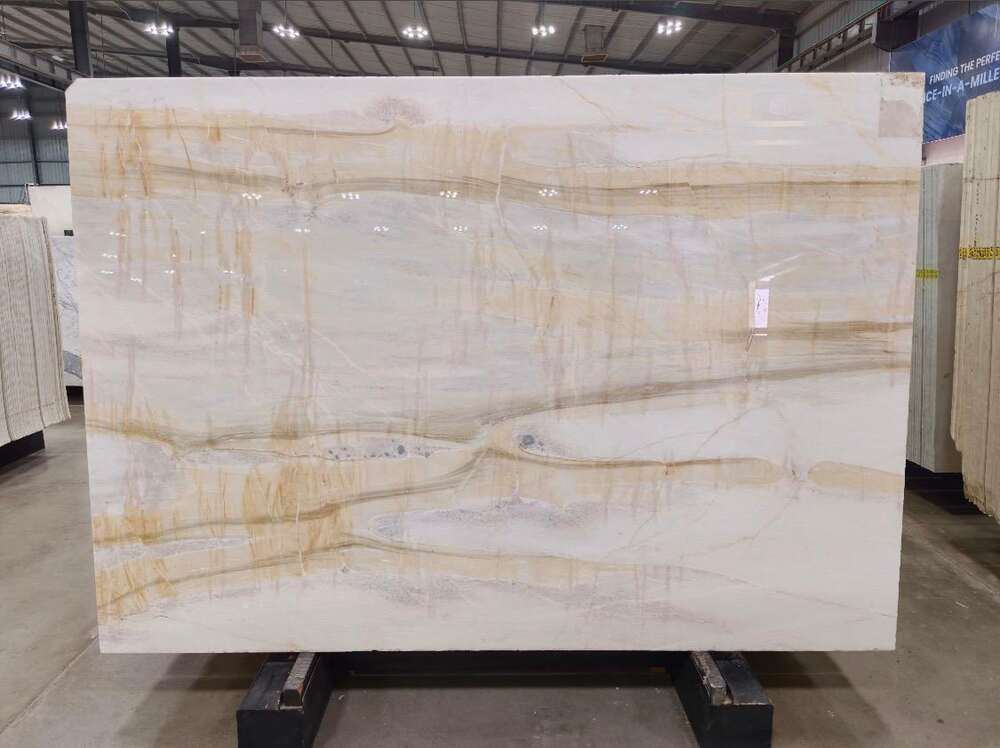 Cream marble slab with gold and grey veining